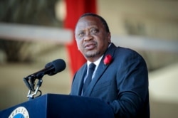 Kenya's President Uhuru Kenyatta speaks during the state funeral of Kenya's former president Daniel arap Moi, at Nyayo Stadium in the capital Nairobi, Feb. 11, 2020.