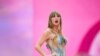 ARCHIVO - Taylor Swift actúa en el estadio de Wembley como parte de su gira Eras, el 21 de junio de 2024, en Londres. 