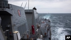 The guided-missile destroyer USS Ralph Johnson conducts routine operations in the Taiwan Strait on Sept. 9, 2023 (U.S. Navy via AP). U.S. officials said on Oct. 5, 2023, that China may not have the appetite for an attempted blockade of Taiwan. 