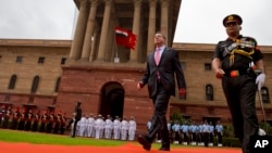 U.S. Defense Secretary Ashton Carter inspects a Guard of Honor during his ceremonial welcome in New Delhi, India, Wednesday, June 3, 2015.