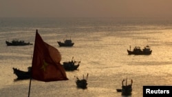 FILE - Fishing boats are seen on bay of Ly Son islands of Vietnam's central Quang Ngai province.