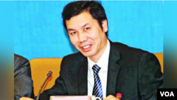 前香港商報助理總編輯龍鎮洋