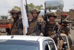 Taliban special forces fighters arrive at the Hamid Karzai International Airport after the U.S. military's withdrawal, in Kabul, Afghanistan, Aug. 31, 2021.