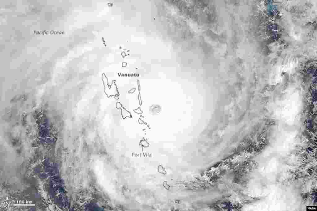 Cyclone Pam was heading in a southwesterly direction when the Moderate Resolution Imaging Spectroradiometer (MODIS) on NASA’s Aqua satellite acquired this image at 1:30 p.m. local time (2:20 Universal Time) on March 13, 2015. Not long after the image was acquired, the storm struck the island of Efate, which is home to Vanuatu’s capital city, Port Vila.