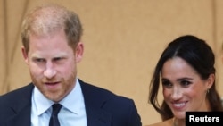 ARCHIVO - El príncipe Enrique y su esposa Megan en una actividad en Nueva York, el 10 de octubre de 2023.