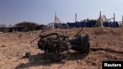 پارچەی یەکێک لە موشەکەکان کە بەپێی بەرپرسانی ئیسڕائیلی بووەتە هۆی برینداربوونی منداڵێکی تەمەن 7 ساڵ.