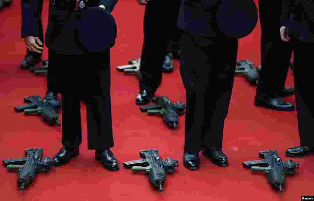 Rifles lie on the ground as guests arrives for the annual Lord Mayor's Banquet at Guildhall in London, Nov. 15, 2021.
