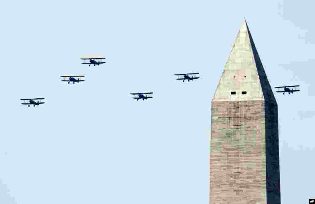 World War II vintage aircraft flyover near the Washington Monument in Washington, D.C., May 8, 2015, marking the 70th anniversary of the end of the war in Europe, and to commemorate the Allied victory in Europe during World War II.
