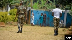 FILE - Soldiers patrol in Bafut, in the northwest English-speaking region of Cameroon, Nov. 15, 2017.