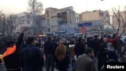People protest in Tehran, Iran, Dec. 30, 2017, in this still image from a video.
