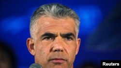 Yair Lapid, líder del partido entrista Yesh Atid, podría convertirse esta semana en el nuevo primer ministro de Israel, desplazando a Benjamín Netanyahu.