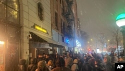 People gather outside the Bowery Ballroom where Paul McCartney’s surprise show was held in New York, Feb. 11, 2025.