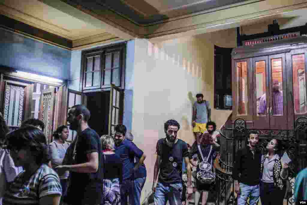 Every year activists mark the death of Hisham Rizk by showing his graffiti art in a Cairo exhibit. The artist was found dead in the Nile river in July 2014 after posting on Facebook: “I’ll keep painting, and if I ran out of colors, I’ll paint with my blood. I feel honored to belong to this struggling community of activists,” Cairo, Egypt, July 19, 2017. (H. Elrasam/VOA)