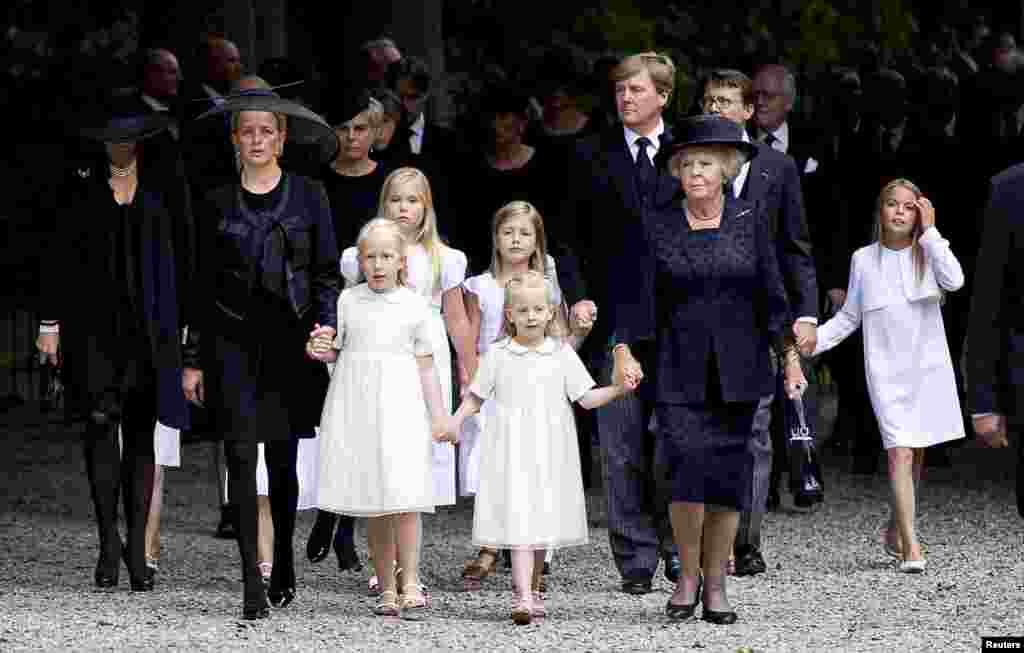 Netherlands' Princess Mabel (2nd L-2nd R), accompanied by her daughters Luana and Zaria, and Princess Beatrix lead the Dutch royal family as they arrive for the funeral service of Beartix' son Prince Friso at the Stulpkerk church in Lage Vuursche. Friso, the brother of the new Dutch king, died on Aug. 12, 2013, in a royal palace in The Hague, 18 months after a skiing accident left him in a coma.