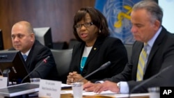Dr. Carissa F. Etienne (c) director, PAHO speaks during an announcement that Cuba is world's first country to receive validation of having eliminated mother-to-child transmission of HIV and Syphilis, June 30, 2015 in Washington.