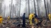 Rain Helps to Put Out California Fire, Complicates Search