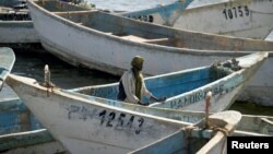 Artisanal fishing boats moored in the harbor at Nouadhibou, the main port in Mauritania, April 14, 2018.