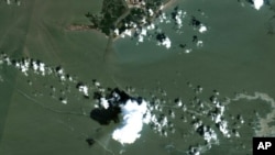 An oil slick is shown on Sept. 2, 2021, south of Port Fourchon, La. The U.S. Coast Guard said Sept. 4 that cleanup crews were responding to a sizable oil spill in the Gulf of Mexico following Hurricane Ida. (Maxar Technologies via AP)