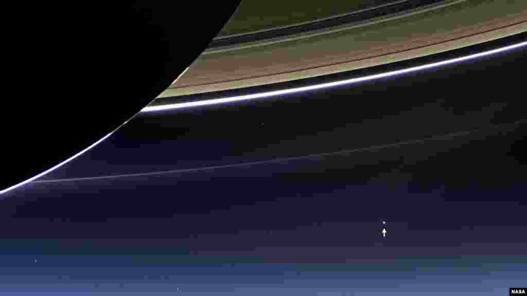 In this rare image taken on July 19, 2013, the wide-angle camera on NASA's Cassini spacecraft has captured Saturn's rings and our planet Earth and its moon in the same frame. (Credit: NASA/JPL-Caltech/Space Science Institute) 