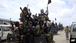 Al-Shabab fighters display weapons in Mogadishu, Somalia (undated file photo).