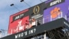 College Football Lovers Live for Weeks on Large Sign