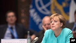 FILE - German Chancellor Angela Merkel during the opening ceremony of the G20 Leaders Summit in Hangzhou, Sept. 4, 2016. She says she's not happy about the possible demise of the Trans-Pacific Partnership trade agreement. 