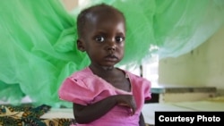 Lozimary* is 17 months old and weighed just 16 pounds when she arrived at the hospital in central Malawi, and she was severely malnourished. She was refusing to eat and had lost weight. She recovered well after being admitted to the hospital and having first received therapeutic milk and then a nutritional peanut paste. Photo by Oli Cohen/Save the Children. (* after a name indicates that the name has been changed to protect identity. 