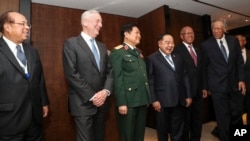 U.S. Defense Secretary Jim Mattis (2nd-L) laughs with Southeast Asian defense ministers after their meeting at the 17th International Institute for Strategic Studies Shangri-la Dialogue in Singapore, June 1, 2018. 