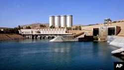 FILE - A general view of the dam in Mosul, 360 kilometers (225 miles) northwest of Baghdad, Iraq. U.S. engineers examining the dam say they have found new signs of distress in the massive structure and it is now at "significantly higher risk" of failure that could devastate vast areas to the south.