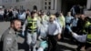 Palestinians Kill 5 in Attack on Jerusalem Synagogue