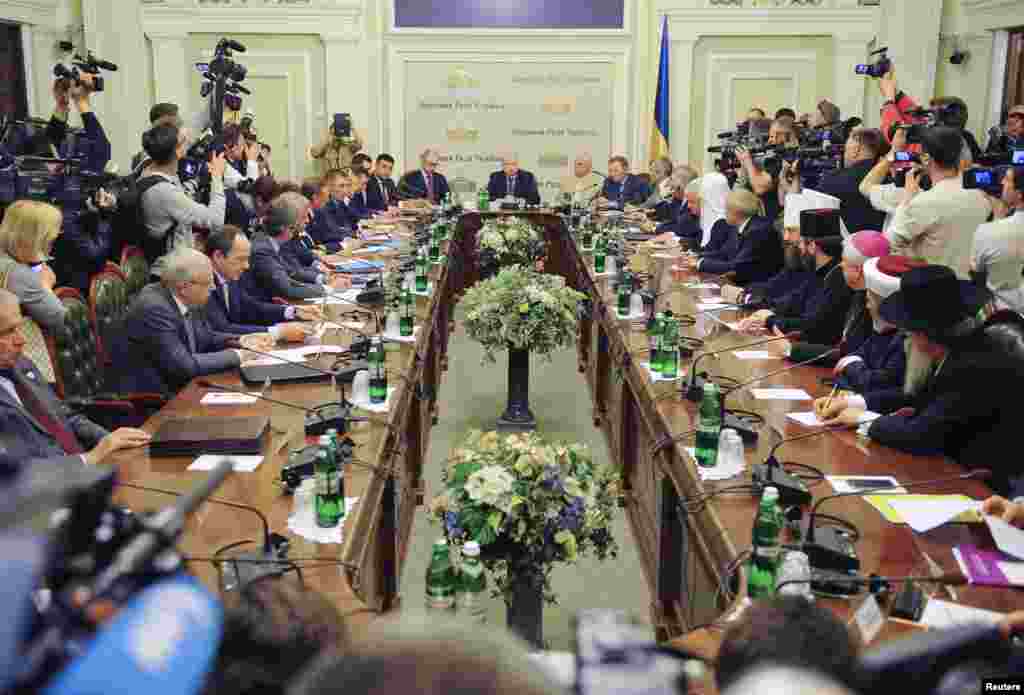 Participants gathered on Wednesday, May 14 for talks on how to quell a pro-Russian rebellion in the east, but Kyiv's refusal to let separatists take part cast doubt on whether the meeting could defuse the crisis in Ukraine's capital, Kyiv, May 14, 2014.