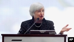 FILE - Federal Reserve Chairman Janet Yellen speaks during a conference on economic opportunity at the Federal Reserve Bank in Boston, Oct. 17, 2014.