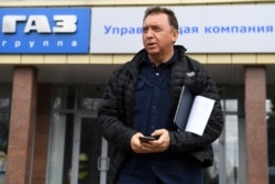 FILE - Russian oligarch Oleg Deripaska is seen outsite his GAZ car production plant in Nizhny Novgorod, Russia, April 16, 2019.