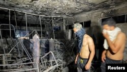 Soba u kojoj su se lečili Kovid pacijent potpuno izgorela (REUTERS/Thaier Al-Sudani)