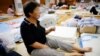 After Floods, Japan Suffers in Heat Without Water
