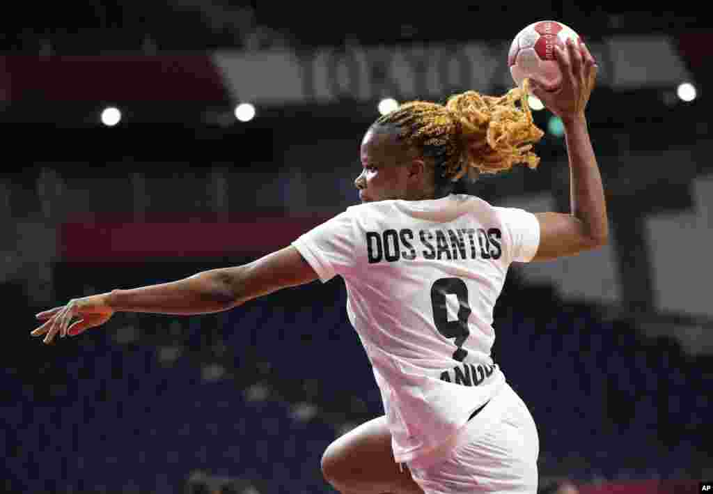 Angola's Natalia Santos in action during the women's preliminary round group A handball match between Montenegro and Angola at the 2020 Summer Olympics, Sunday, July 25, 2021, in Tokyo, Japan. (AP Photo/Sergei Grits)