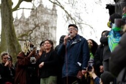Former Labor Party leader Jeremy Corbyn addresses demonstrators during a 'Kill the Bill' protest in London, April 3, 2021. The demonstration is against the contentious Police, Crime, Sentencing and Courts Bill going through Parliament.