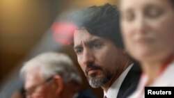 Le premier canadien Justin Trudeau lors d'une conférence de presse ministérielle à la Colline du Parlement à Ottawa, Ontario, le 1er mai 2020.
