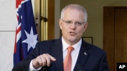 Australian Prime Minister Scott Morrison addresses media at Parliament House in Canberra, Australia, Feb. 13, 2019.