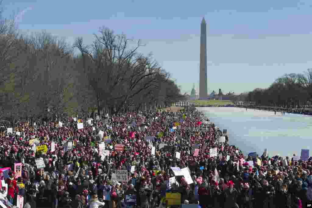 Participants in the Women's March gather near the Lincoln Memorial in Washington, Jan. 20, 2018.