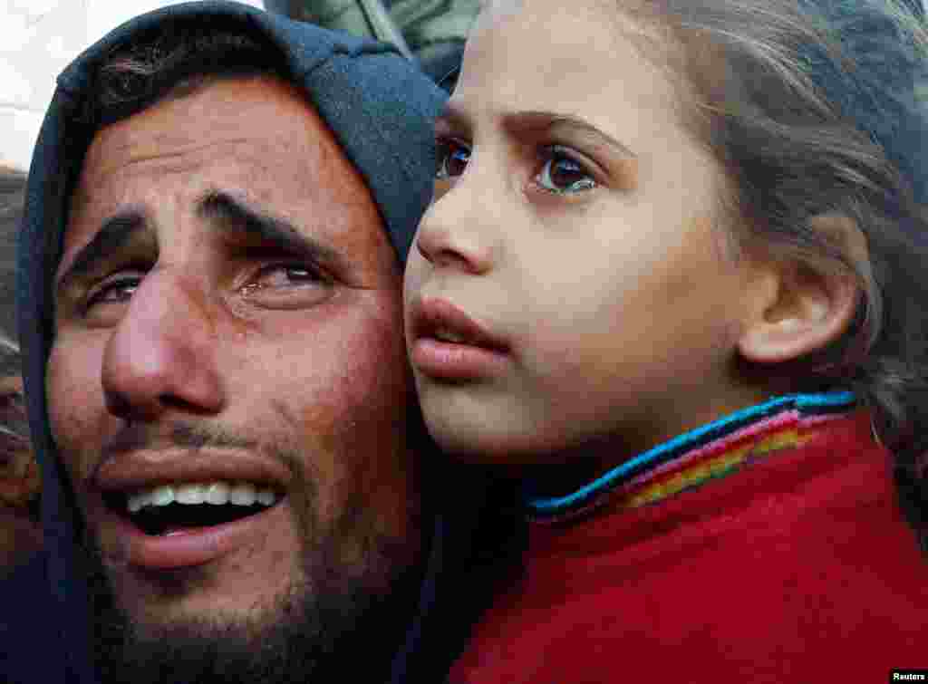 People mourn Palestinians killed in an Israeli strike at Nasser hospital in Khan Younis in the southern Gaza Strip.