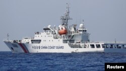 A China Coast Guard vessel patrols at the disputed Scarborough Shoal April 6, 2017. 