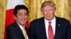 President Donald Trump and Japanese Prime Minister Shinzo Abe shake hands following their joint news conference in the White House in Washington, Feb. 10, 2017. 