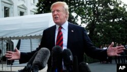 President Donald Trump speaks to reporters before leaving the White House in Washington, June 8, 2018, to attend the G7 Summit in Charlevoix, Quebec, Canada. 