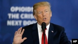 President Donald Trump speaks about his plan to combat opioid drug addiction at Manchester Community College, March 19, 2018, in Manchester, New Hampshire. 