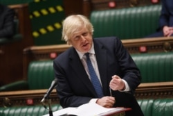 FILE - Britain's Prime Minister Boris Johnson speaks during the weekly question time debate at the House of Commons in London, Britain, March 10, 2021. (UK Parliament/Jessica Taylor/Handout via Reuters)