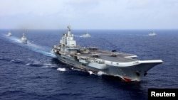2018年4月18日，中國航母遼寧號參加中國海軍在西太平洋的軍事演習。