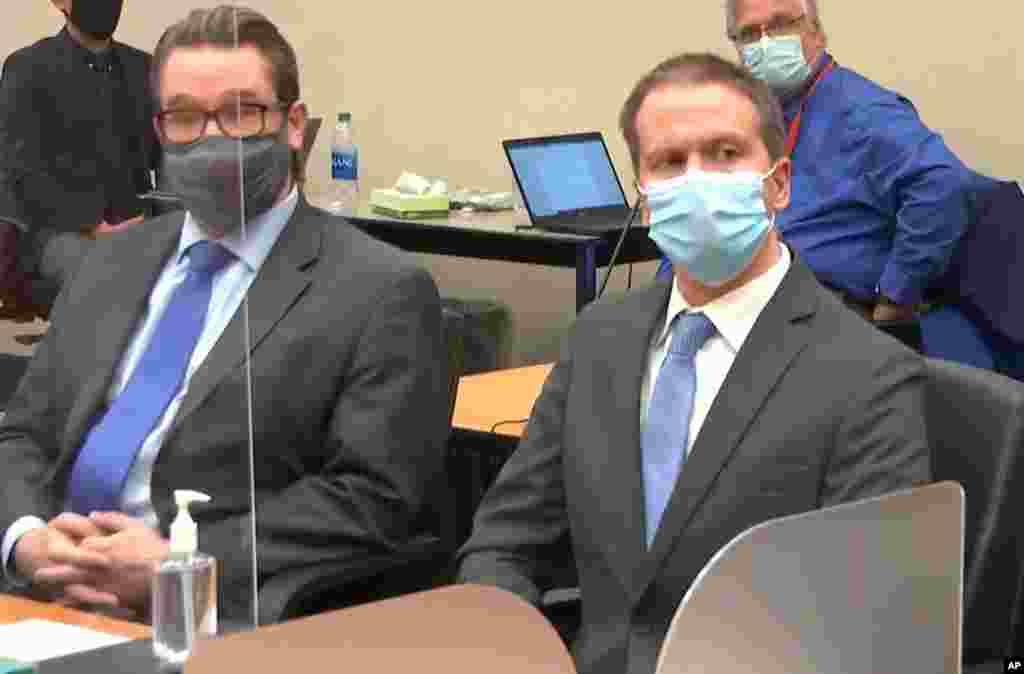 FILE - In this image from video, defense attorney Eric Nelson, left, and former Minneapolis police Officer Derek Chauvin are set for the verdict in Chauvin's trial for the 2020 death of George Floyd.