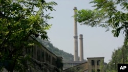 FILE - Ninh Binh Power Plant, which is a coal fired power plant to supply electricity, is seen in Ninh Binh Province in Vietnam, Sept. 19, 2007. The Asian Development Bank agreed Friday to loan Vietnam nearly $1 billion to build a coal-fired power plant 