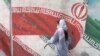 Iran Resorts to Security Cameras, Ostracism to Deter Unveiled Women